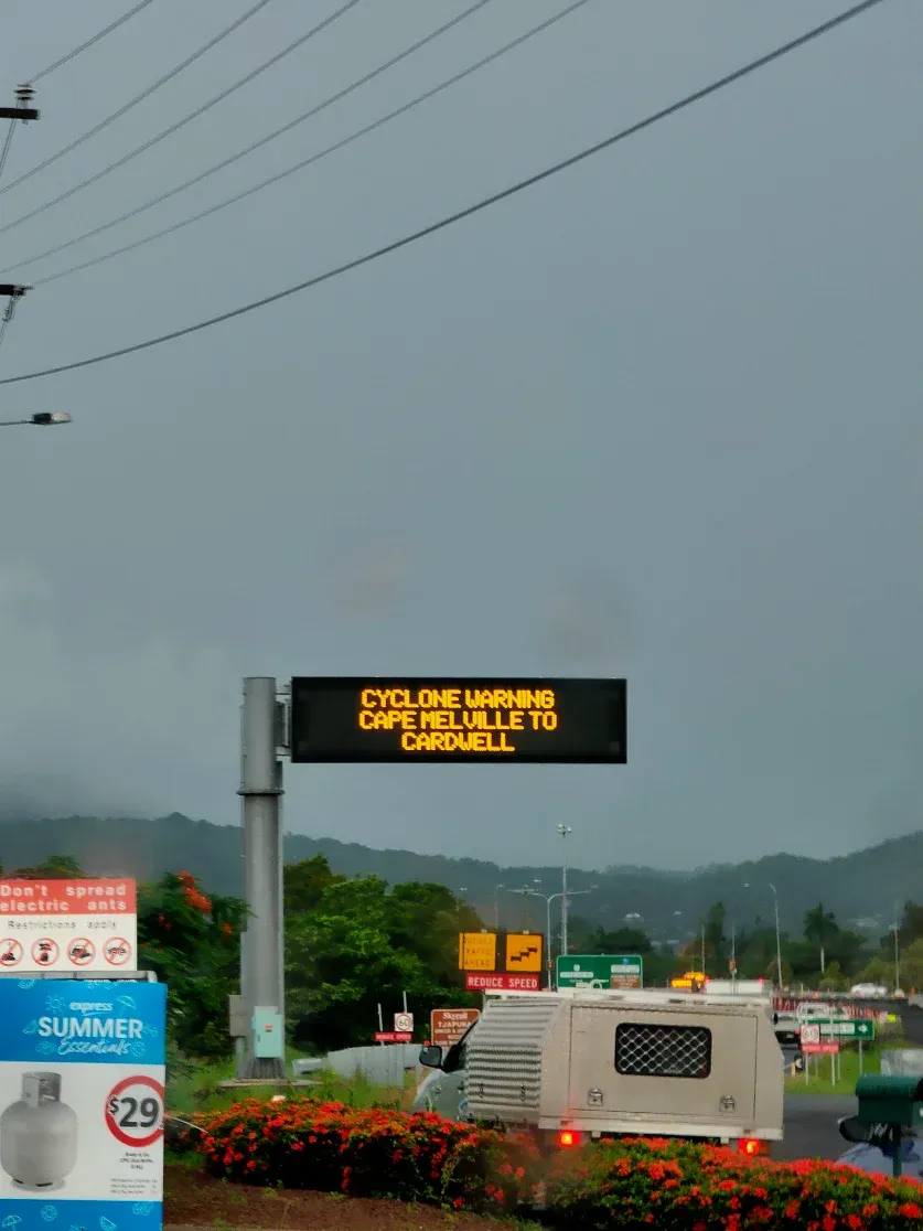Cyclone warning sign on the Bruce Highway approach to Cairns: Cape Melville to Cardwell